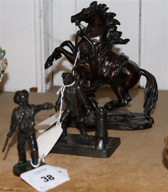 Small bronze figure of a sailor with cutlass, another of a shoe shine boy and a Marly horse group after Coustou